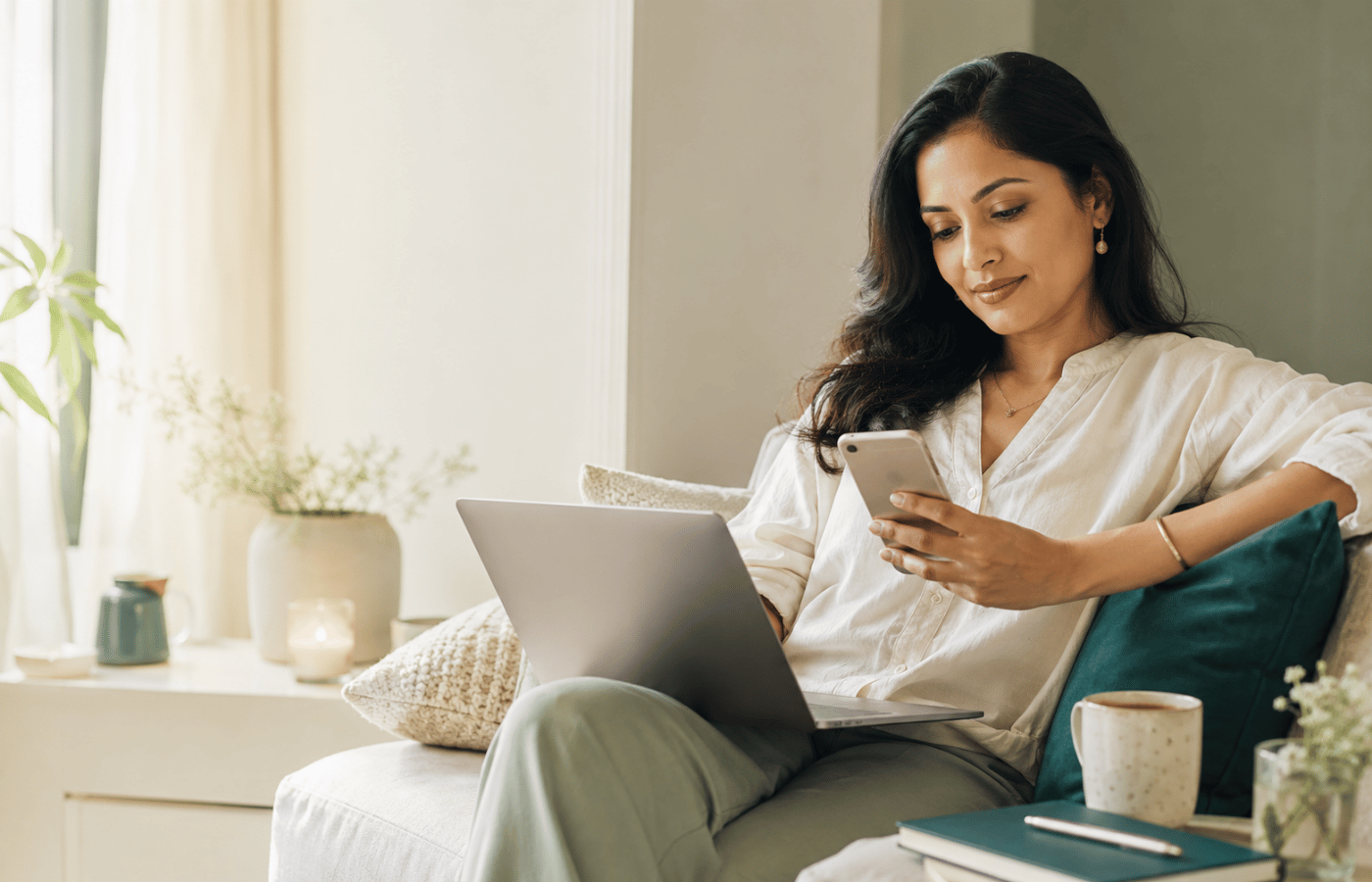 A calm woman reading privacy information on her laptop at home